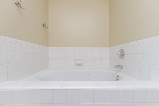 bathroom featuring a bath