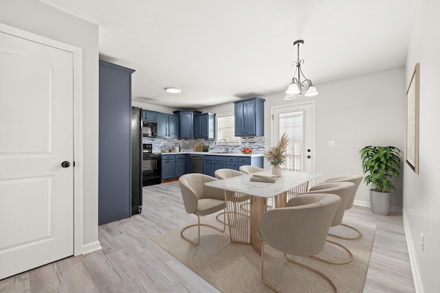 1008 Alexandria Dr, Lawrenceburg, KY 40342 - dining space featuring baseboards and light wood finished floors