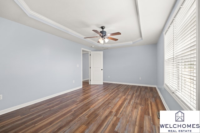 1008 Alexandria Dr, Lawrenceburg, KY 40342 - empty room with a tray ceiling, ceiling fan, baseboards, and dark wood-style floors