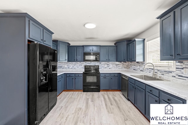 1008 Alexandria Dr, Lawrenceburg, KY 40342 - kitchen with black appliances, light countertops, tasteful backsplash, and a sink