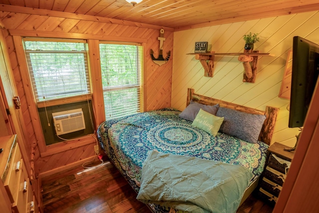 bedroom with wood ceiling, wood-type flooring, and wood walls