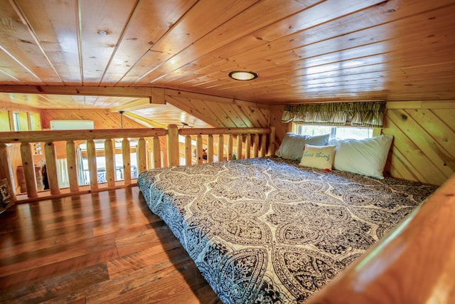 bedroom featuring wood-type flooring, wood walls, and wood ceiling