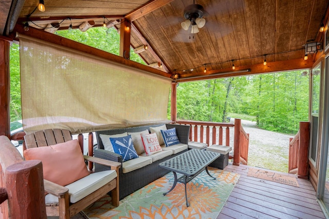 wooden terrace featuring outdoor lounge area