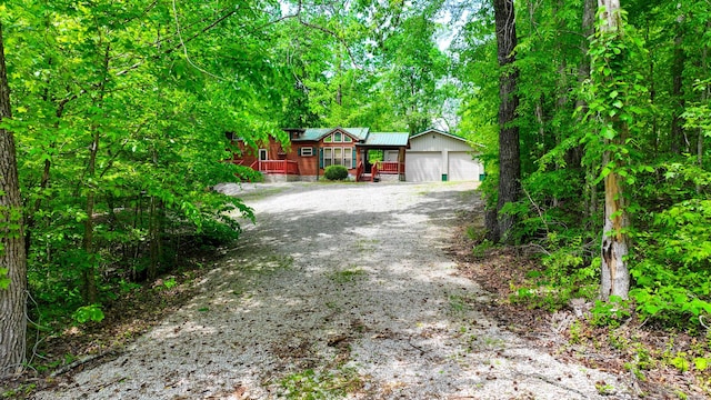 view of front of house with a detached garage