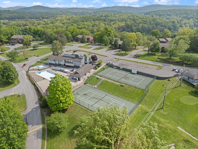 bird's eye view featuring a view of trees and a mountain view
