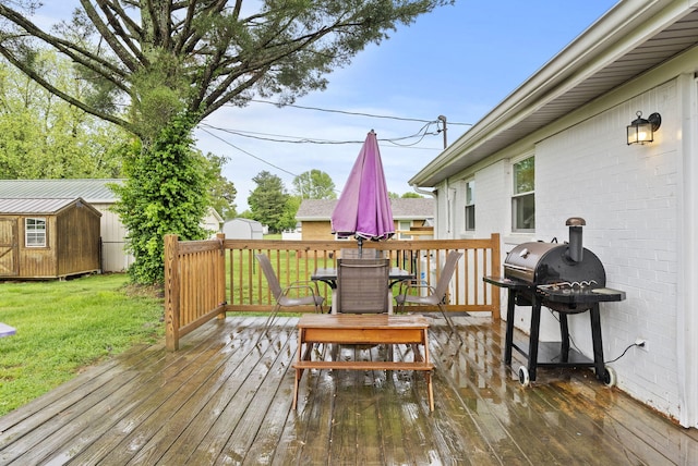 220 Garden Ave, Stanford, KY 40484 - deck featuring grilling area, an outdoor structure, a shed, a yard, and outdoor dining space
