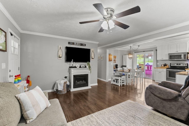 220 Garden Ave, Stanford, KY 40484 - living room featuring baseboards, ceiling fan, crown molding, and wood finished floors