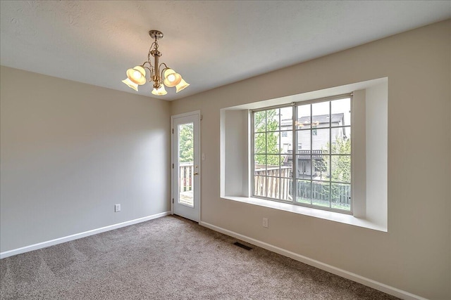 1148 Oatlands Park, Lexington, KY 40509 - carpeted empty room featuring baseboards, a notable chandelier, and visible vents