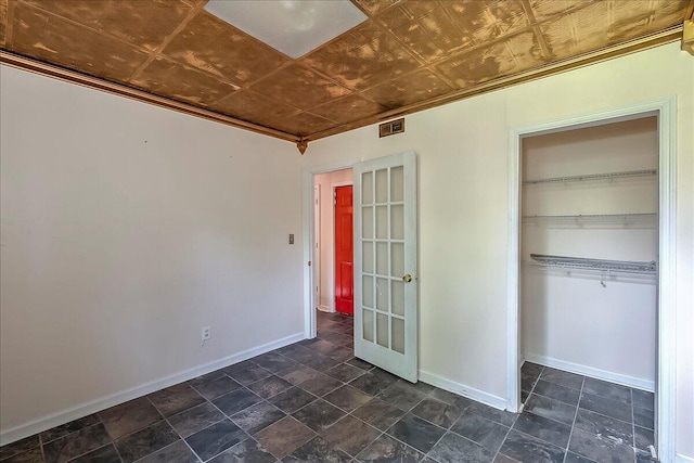 1148 Oatlands Park, Lexington, KY 40509 - unfurnished bedroom featuring visible vents, baseboards, an ornate ceiling, a closet, and ornamental molding