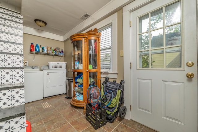 363 S Main St, Winchester, KY 40391 - laundry area with laundry area, independent washer and dryer, visible vents, and a healthy amount of sunlight