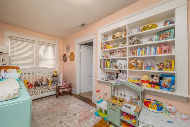363 S Main St, Winchester, KY 40391 - bedroom featuring visible vents and wood finished floors