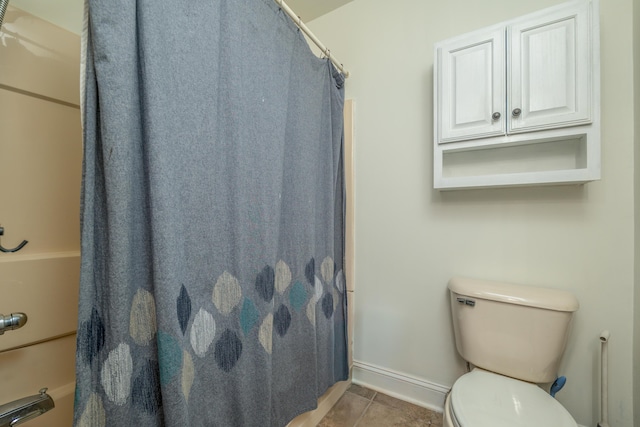 363 S Main St, Winchester, KY 40391 - bathroom with toilet, baseboards, a shower with curtain, and tile patterned flooring