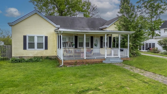 363 S Main St, Winchester, KY 40391 - view of front of home featuring a porch, fence, a front lawn, and a chimney