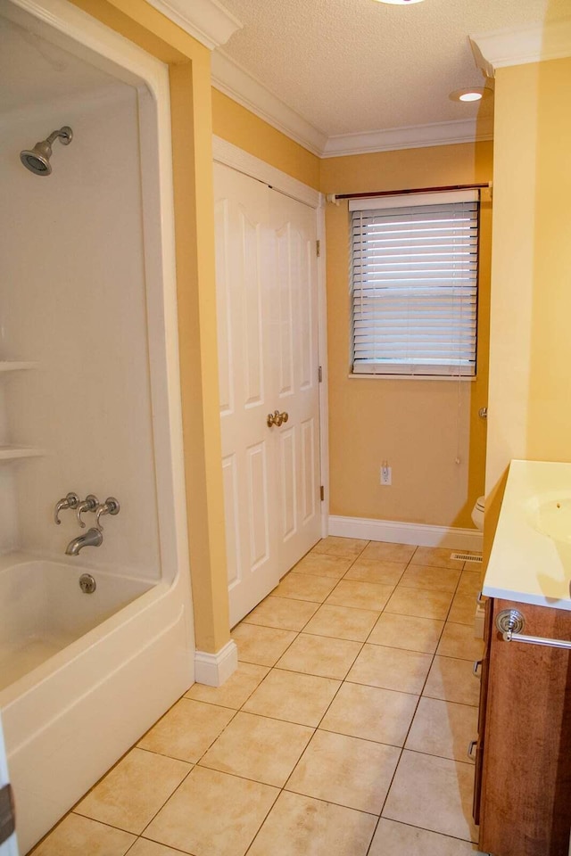 full bathroom with crown molding, bathing tub / shower combination, tile patterned flooring, and vanity