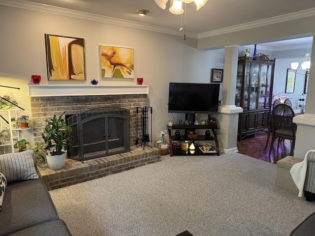 living room featuring crown molding, a ceiling fan, carpet floors, and a fireplace
