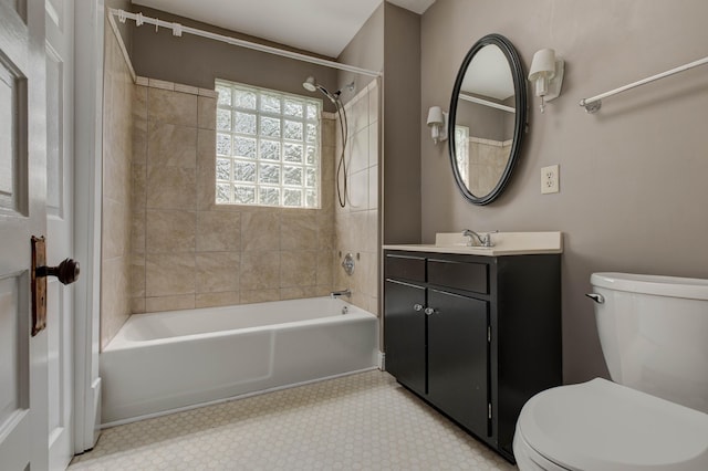 full bathroom with shower / bath combination, vanity, and toilet