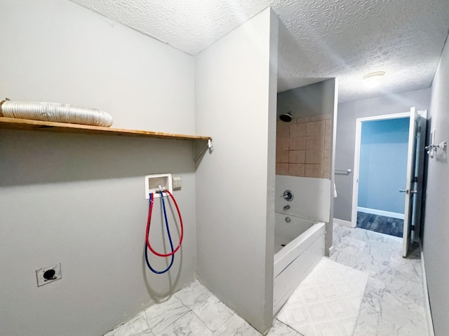 187 Sinnette, Greenup, KY 41144 - bathroom with shower / bath combination, a textured ceiling, and marble finish floor
