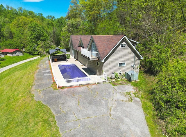 187 Sinnette, Greenup, KY 41144 - pool featuring a view of trees, a patio, a gazebo, and a yard
