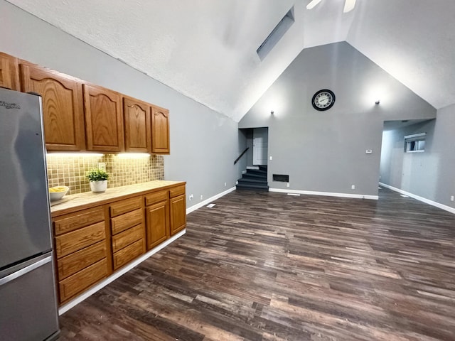187 Sinnette, Greenup, KY 41144 - interior space with stairs, dark wood-style flooring, baseboards, ceiling fan, and vaulted ceiling