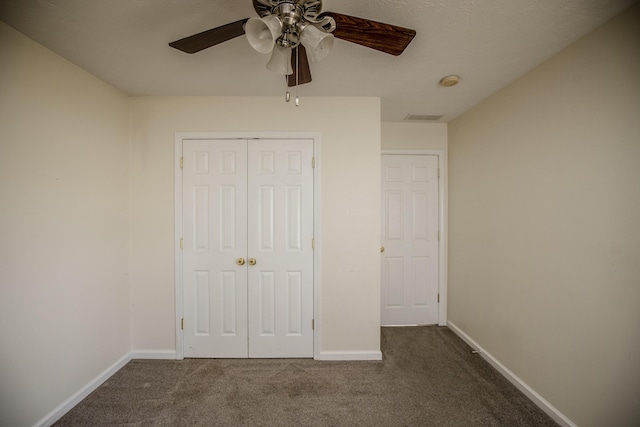 108 Sturbridge Ln, Winchester, KY 40391 - unfurnished bedroom featuring dark carpet, a closet, baseboards, and ceiling fan