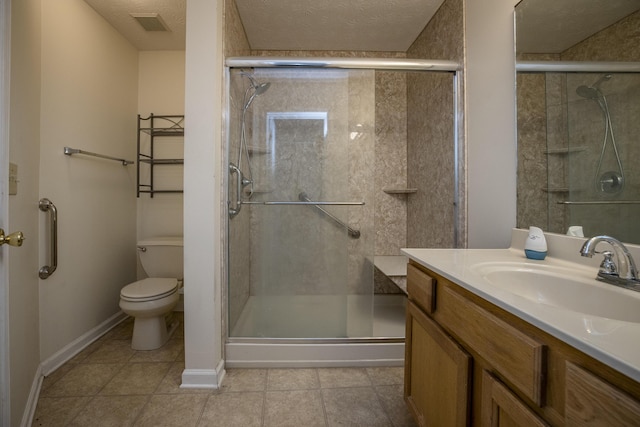 108 Sturbridge Ln, Winchester, KY 40391 - bathroom featuring toilet, vanity, a shower stall, tile patterned floors, and a textured ceiling