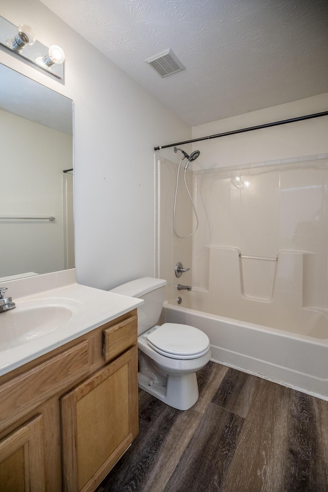 108 Sturbridge Ln, Winchester, KY 40391 - full bathroom featuring wood finished floors, vanity, toilet, and bathtub / shower combination
