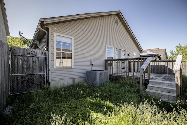 108 Sturbridge Ln, Winchester, KY 40391 - back of house with central air condition unit and a wooden deck