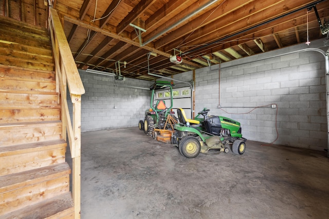 140 Adams Ln, Richmond, KY 40475 - garage with a garage door opener and concrete block wall