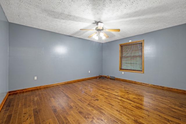 140 Adams Ln, Richmond, KY 40475 - unfurnished room featuring ceiling fan, hardwood / wood-style floors, baseboards, and a textured ceiling