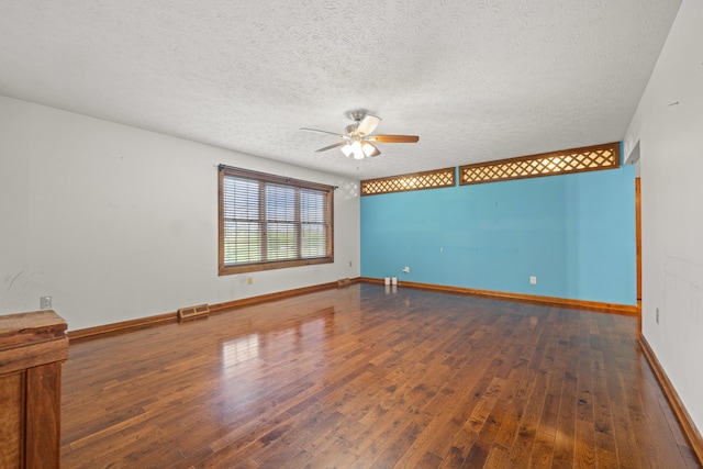 140 Adams Ln, Richmond, KY 40475 - unfurnished room with a ceiling fan, wood-type flooring, a textured ceiling, and baseboards
