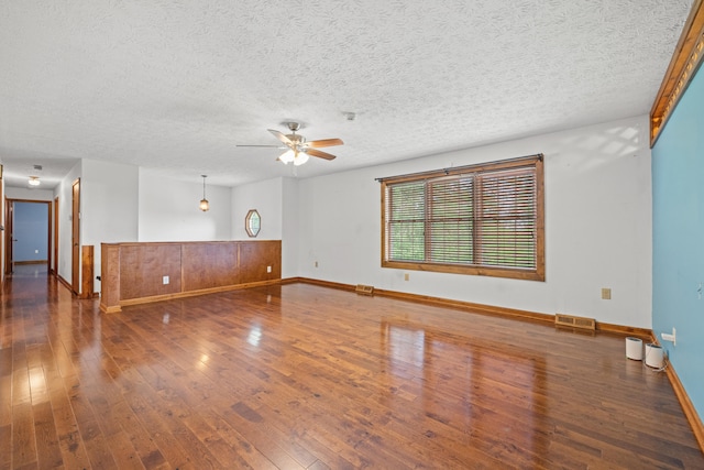 140 Adams Ln, Richmond, KY 40475 - spare room with wood-type flooring, ceiling fan, baseboards, and a textured ceiling