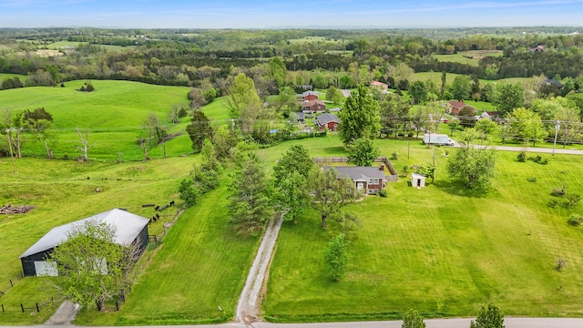 birds eye view of property featuring a rural view