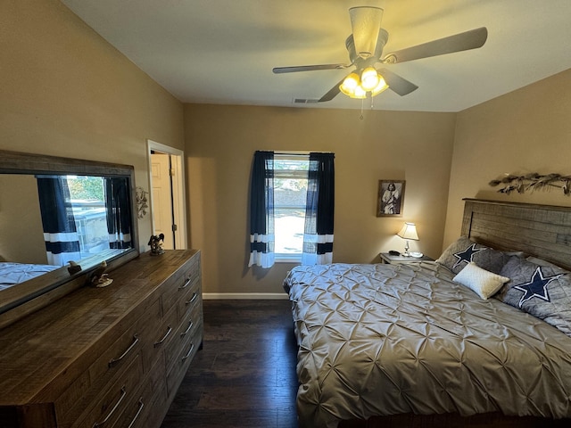 310 W Chestnut St, Nicholasville, KY 40356 - bedroom with dark wood-style flooring, baseboards, and a ceiling fan