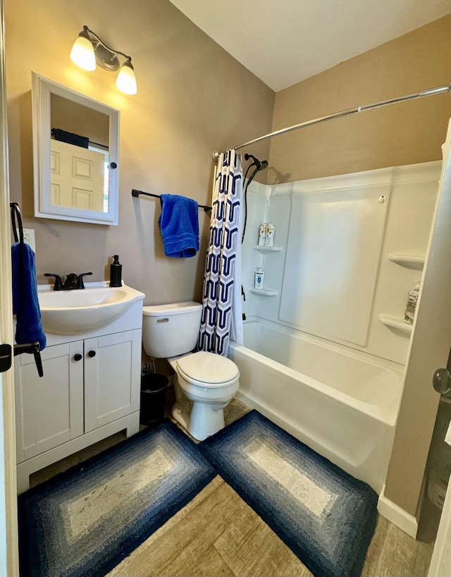 310 W Chestnut St, Nicholasville, KY 40356 - full bath featuring toilet, shower / bath combination with curtain, vanity, and wood finished floors