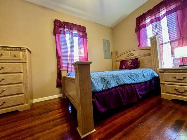 310 W Chestnut St, Nicholasville, KY 40356 - bedroom with dark wood-type flooring, electric panel, and baseboards