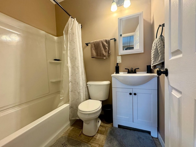 310 W Chestnut St, Nicholasville, KY 40356 - full bathroom with toilet, vanity, shower / bathtub combination with curtain, and baseboards