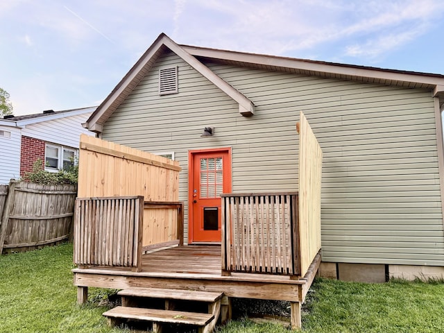 310 W Chestnut St, Nicholasville, KY 40356 - rear view of property with a wooden deck and fence