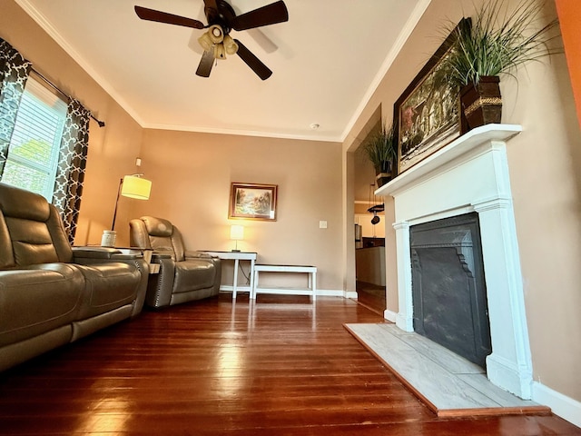 310 W Chestnut St, Nicholasville, KY 40356 - living room with a fireplace with flush hearth, a ceiling fan, wood-type flooring, crown molding, and baseboards