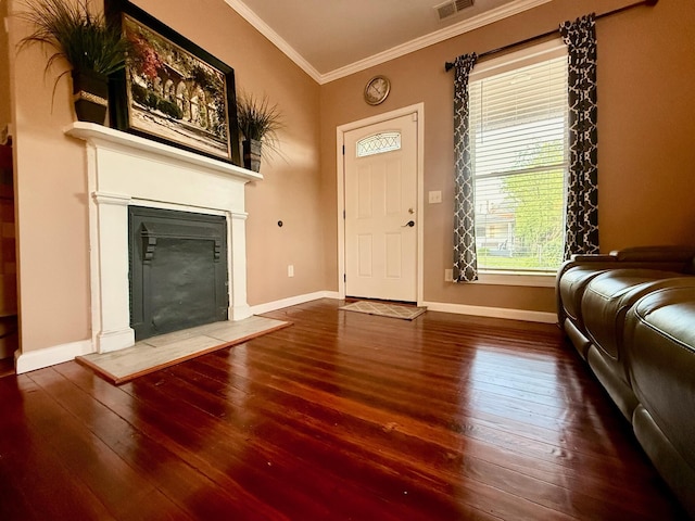 310 W Chestnut St, Nicholasville, KY 40356 - foyer with crown molding, wood-type flooring, a glass covered fireplace, and baseboards