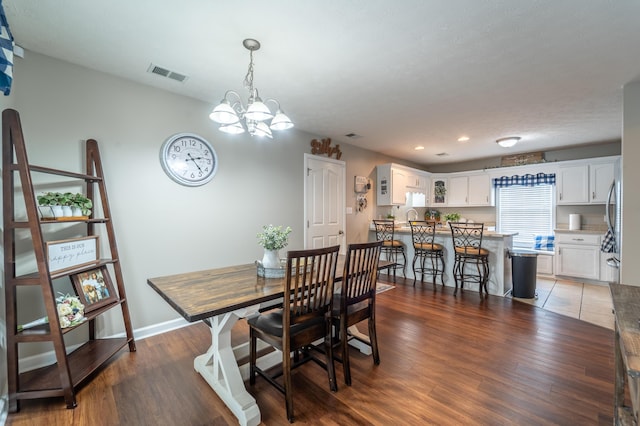 605 Coleman Dr, Berea, KY 40403 - dining space with a chandelier, recessed lighting, visible vents, and wood finished floors