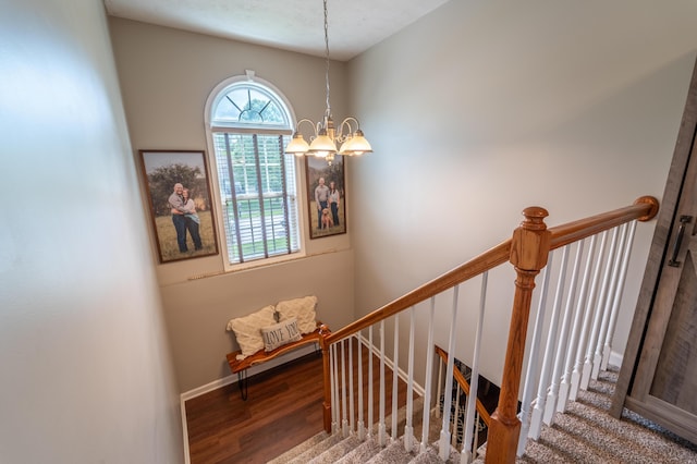 605 Coleman Dr, Berea, KY 40403 - stairway with a chandelier, wood finished floors, and baseboards