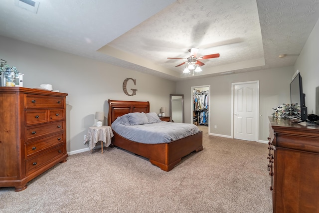 605 Coleman Dr, Berea, KY 40403 - bedroom featuring baseboards, a tray ceiling, visible vents, and light colored carpet