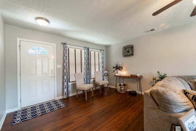 605 Coleman Dr, Berea, KY 40403 - entryway with a textured ceiling, baseboards, ceiling fan, visible vents, and wood finished floors