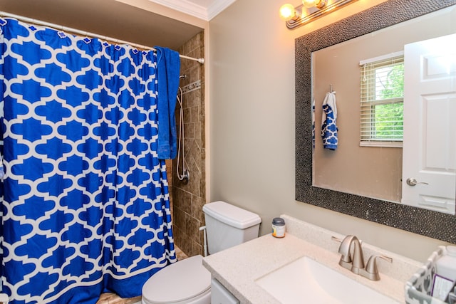 bathroom featuring vanity, ornamental molding, toilet, and a shower with shower curtain