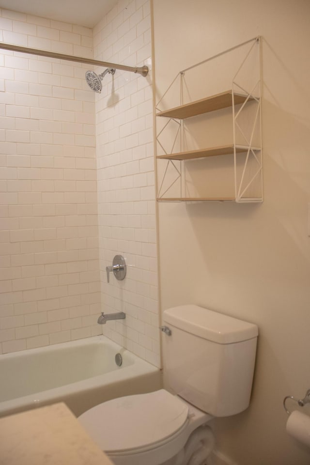 bathroom with toilet and shower / bathing tub combination