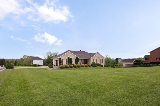 ranch-style home with a front yard