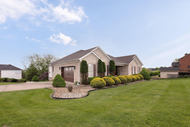 view of front of property with brick siding, a front yard, and an attached garage