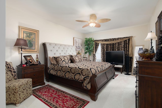 bedroom with light colored carpet and ceiling fan