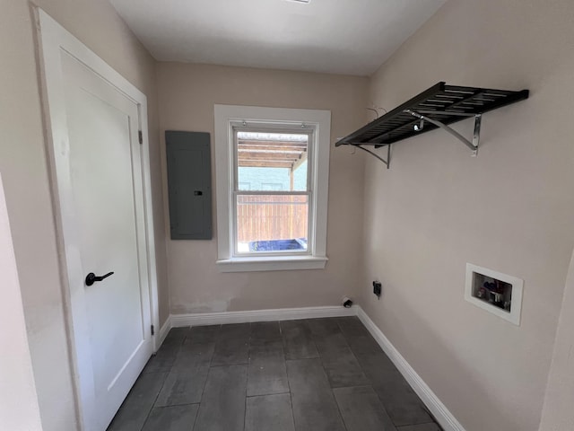 422 Wilderness Rd, Middlesboro, KY 40965 - clothes washing area featuring electric panel, washer hookup, baseboards, and dark wood-type flooring