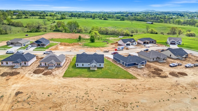 birds eye view of property featuring a rural view and a residential view